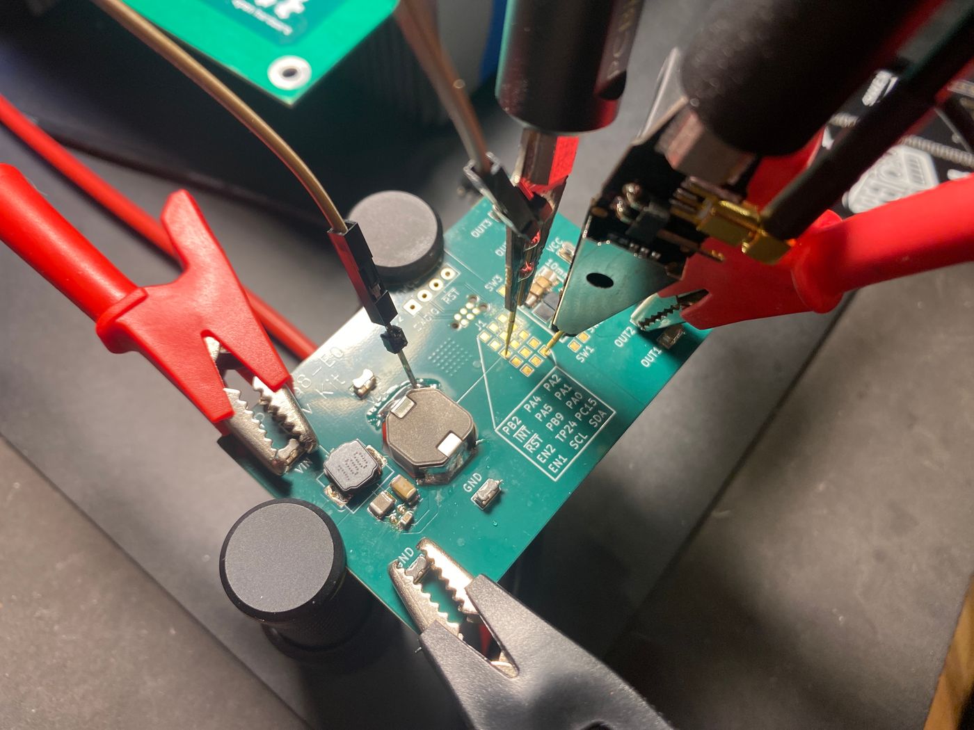 Test probes connected to the Mini Zynq board during bring-up